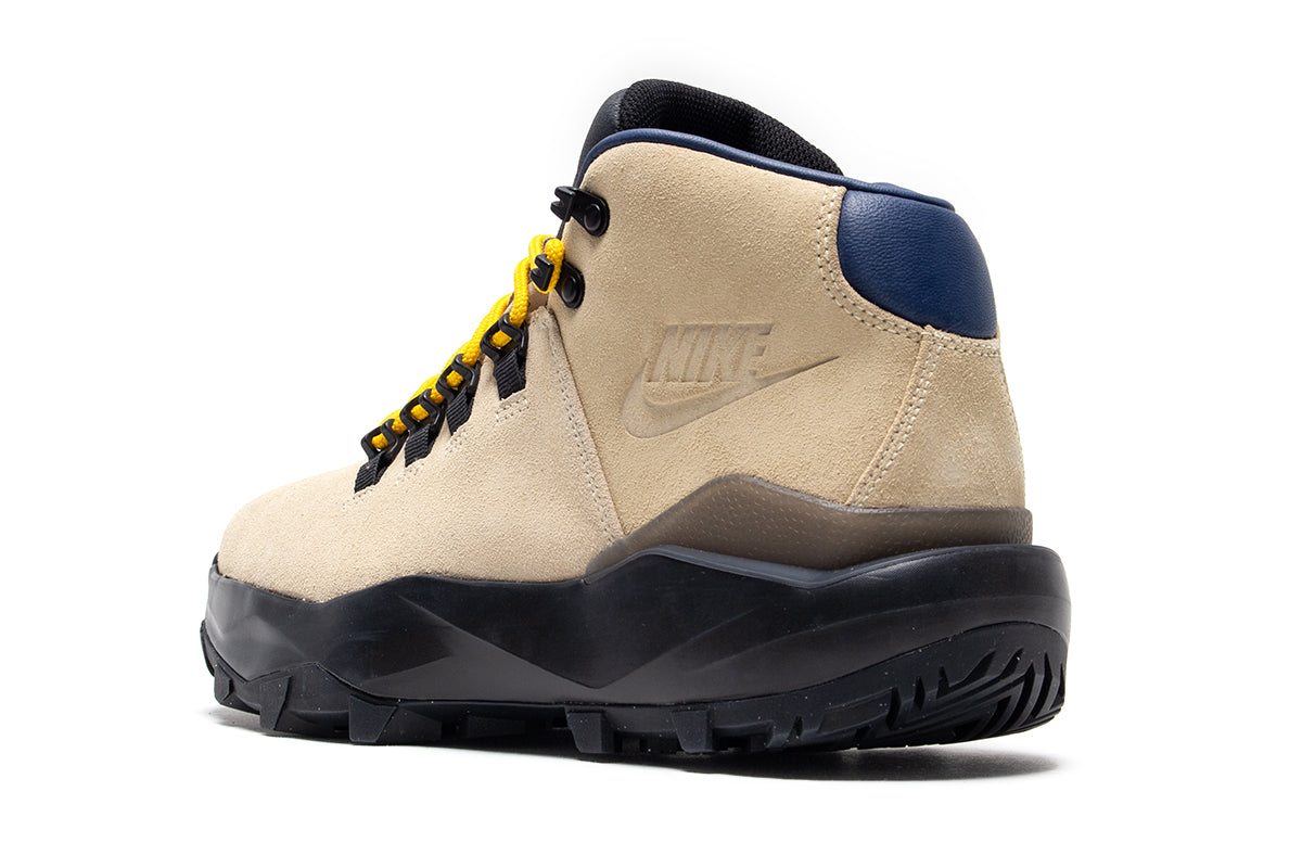 Nike | ACG Cygnal
Style # FV4332-201
Color : Desert Ore / Navy / Black / University Gold