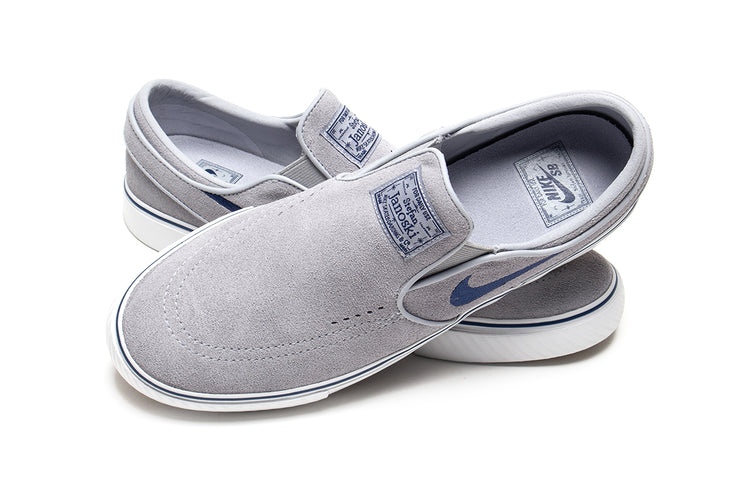 Nike SB | Janoski+ Slip
Style # FN5893-002
Color : Wolf Grey / Navy / Summit White