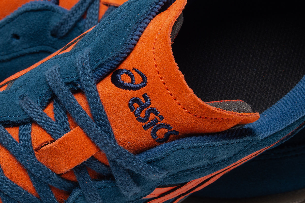 Asics - Skyhand OG
Style # 1203A452.402
Color : Restful Teal / Cherry Tomato