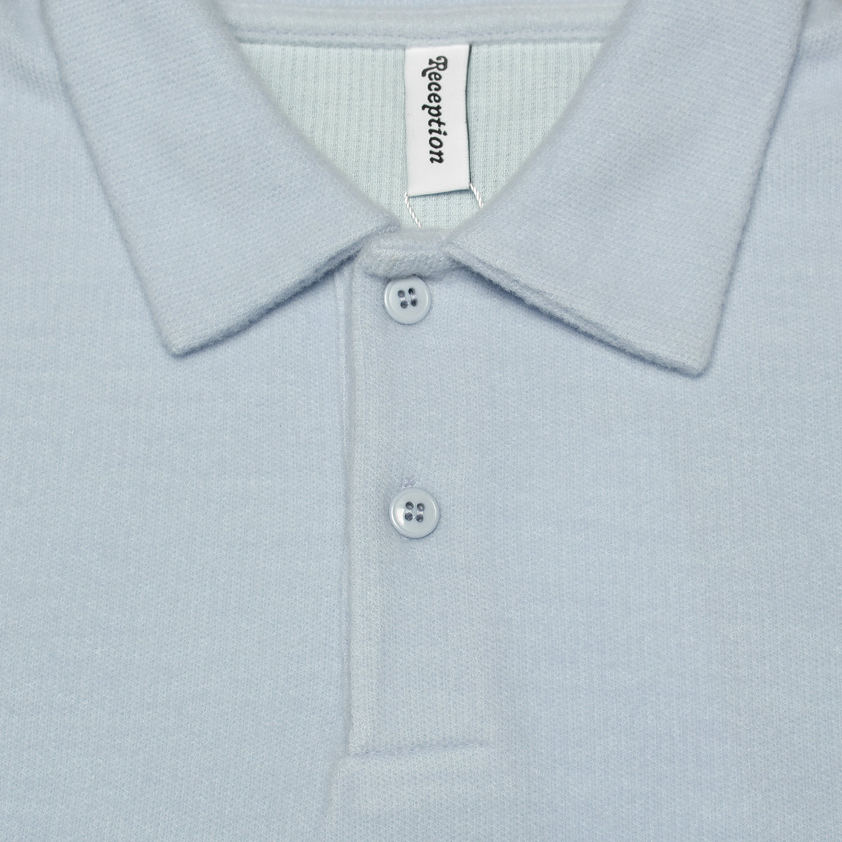 Reception | Interlock Polo Sweat
Color : Ice Blue