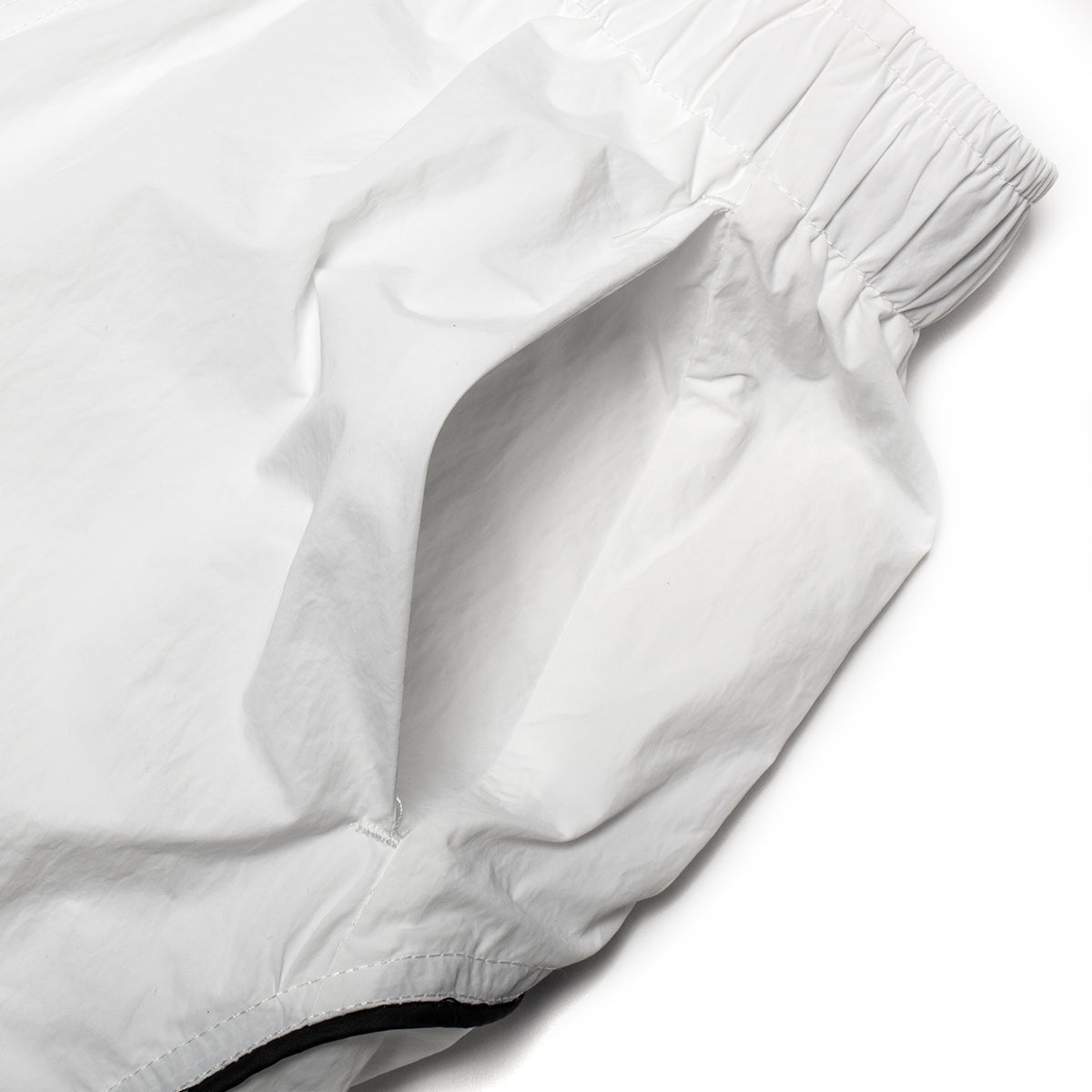Butter Goods - Long Track Shorts x Umbro
Color : White
