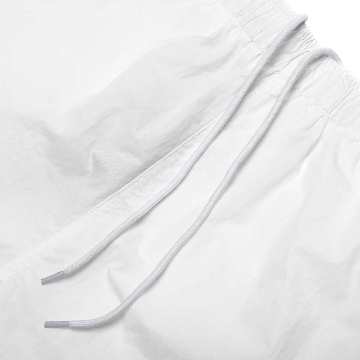 Butter Goods - Long Track Shorts x Umbro
Color : White