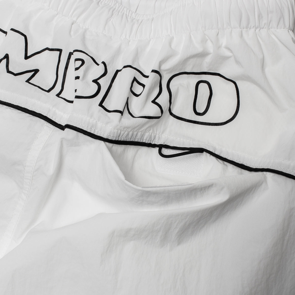 Butter Goods - Long Track Shorts x Umbro
Color : White
