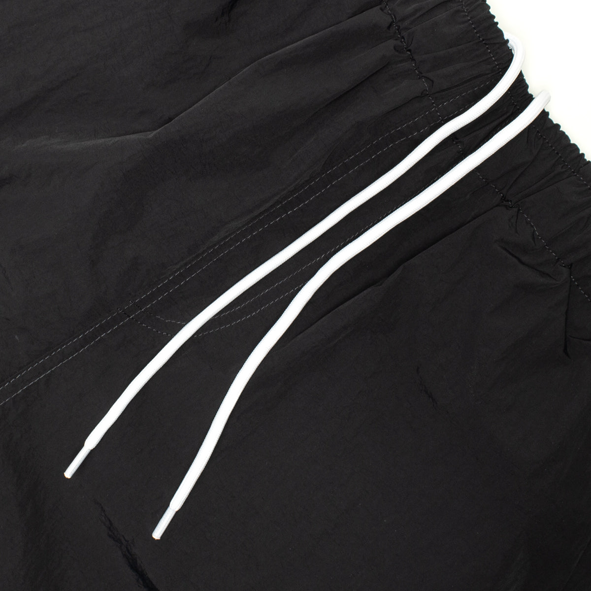 Butter Goods - Long Track Shorts x Umbro
Color : Black