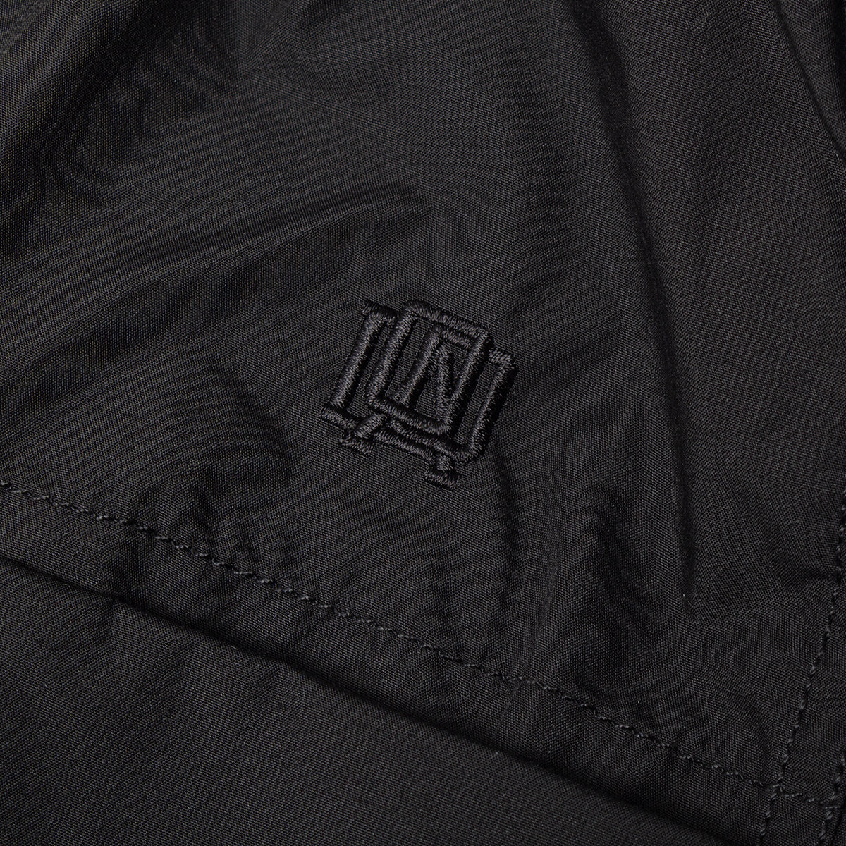 Nanamica - Cargo Deck Pants
Style # S25SC006U
Color : Black