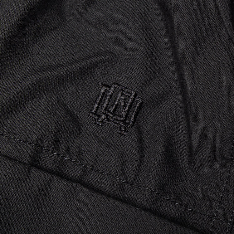 Nanamica - Cargo Deck Pants
Style # S25SC006U
Color : Black