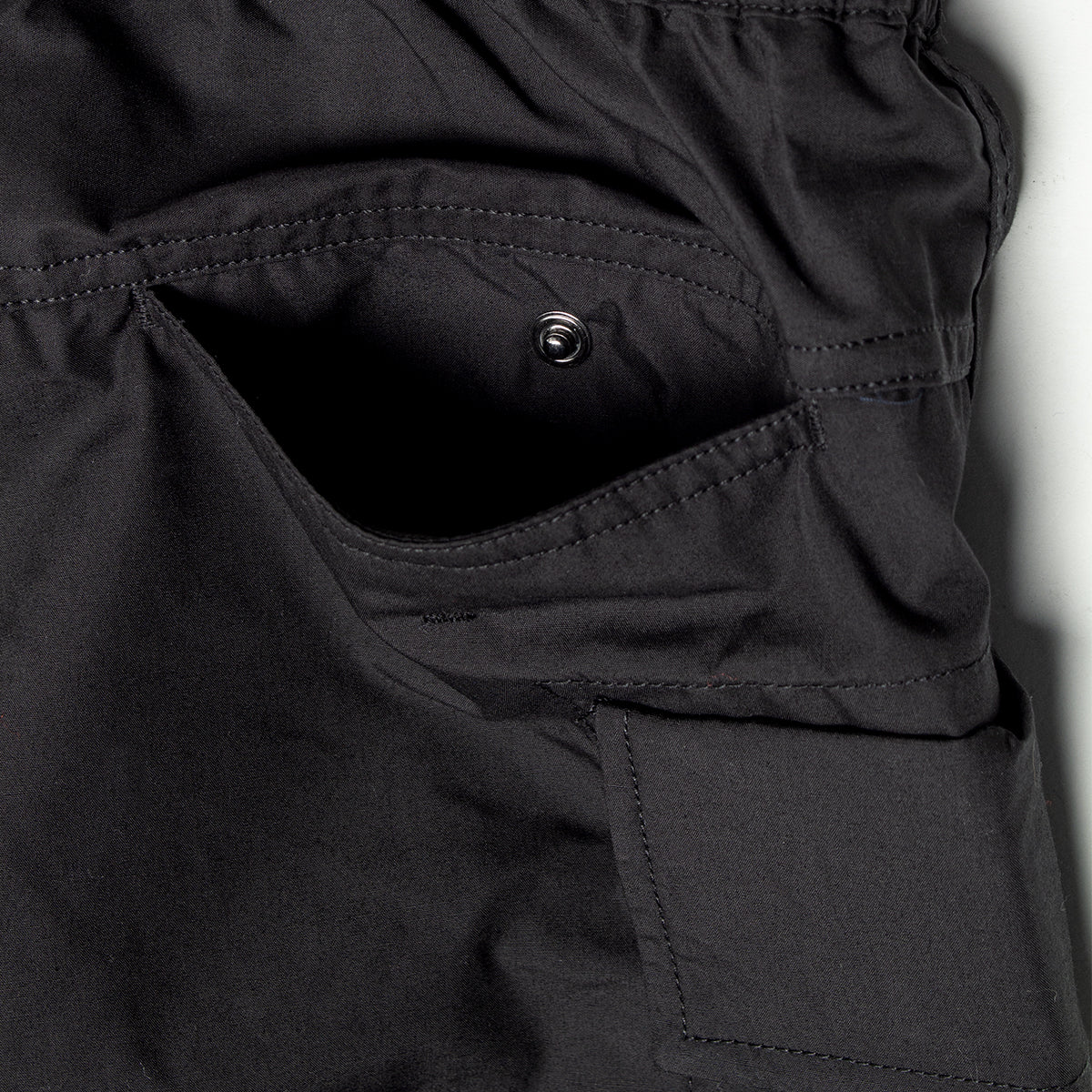 Nanamica - Cargo Deck Pants
Style # S25SC006U
Color : Black