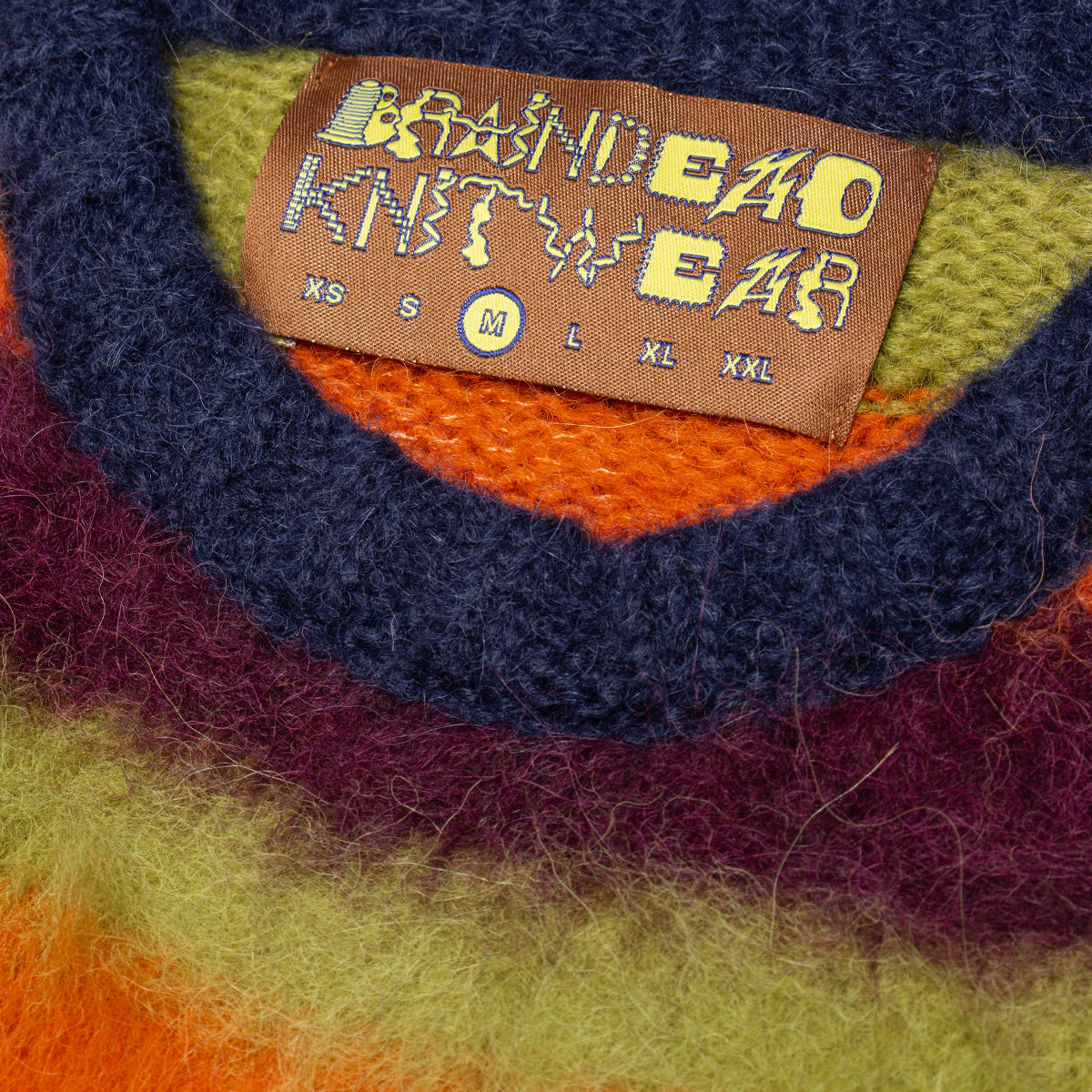 Brain Dead - Blurry Lines Alpaca Crewneck Sweater
Color : Orange / Multi