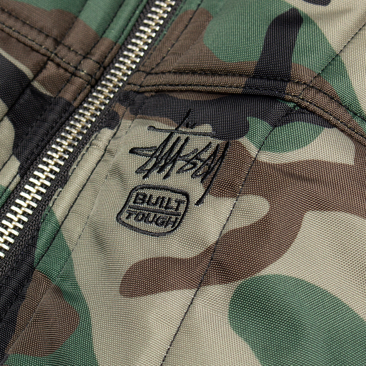 Stussy - Work Jacket Quilted Nylon
Style # 115858
Color : Woodland Camo