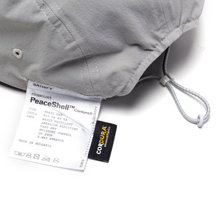 Satisfy - PeaceShell™ Cordura® Trail Cap
Color : Light Grey
Materials : 91% Cordura® Nylon / 9% Polyurethane
Adjustable bungee cord back strap
Exterior detachable care label
PeaceShell™ water-repellent finish
Reflective details
Lightweight
One size