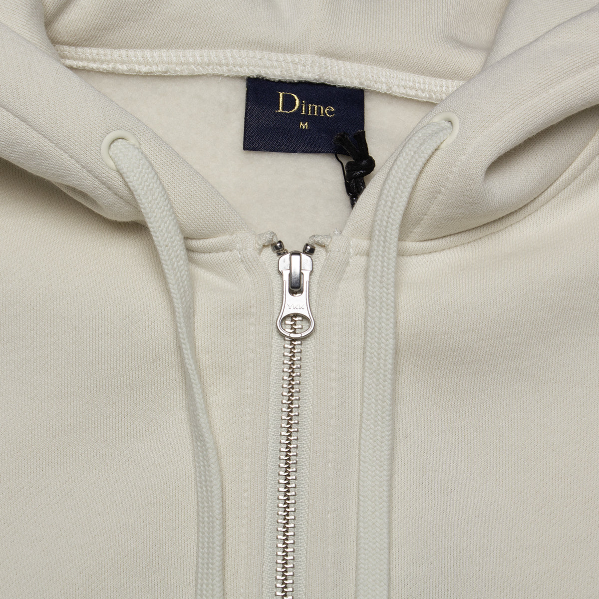 Dime | Cursive Small Logo Zip Hoodie
Color : Natural