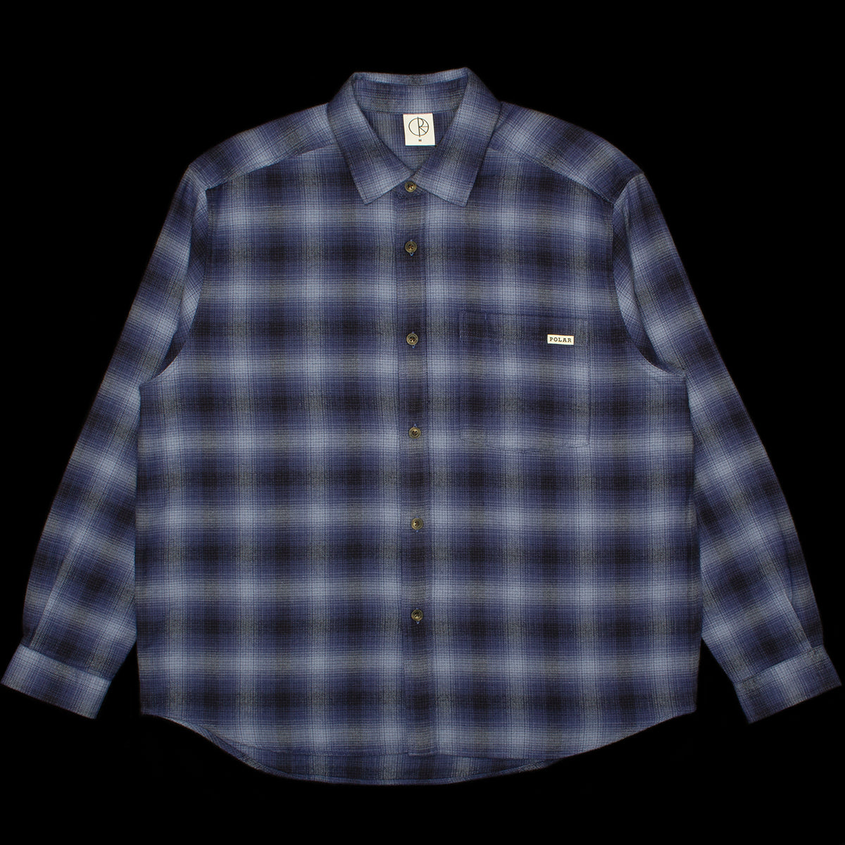 Polar Skate Co. - Mitchell L/S Shirt
Color : Blue
Materials : 100% Brushed Cotton Twill
Garment washed
Dropped shoulders
Loose fit

Custom faux tortoise buttons
Made in Portugal