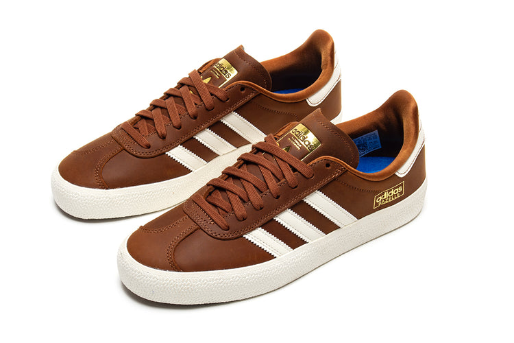Adidas - Gazelle ADV
Style # HQ7547
Color : Brown / White
Materials : Leather / Synthetic Upper - Rubber Outsole
Sizing : US Men's
Cupsole construction