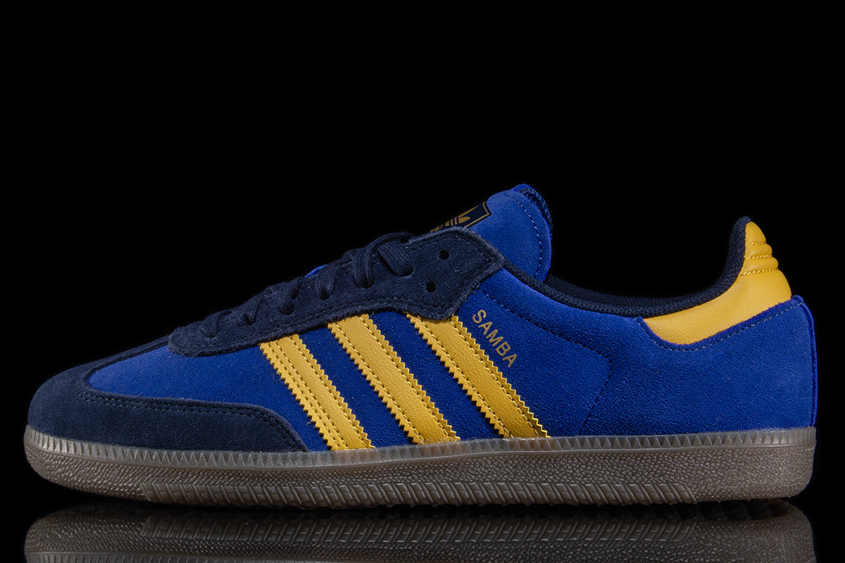 Adidas - Samba ADV
Style # HQ9283
Color : Navy / Yellow / Royal Blue
Materials : Suede Upper - Rubber Outsole
Sizing : US Men's
Cupsole construction