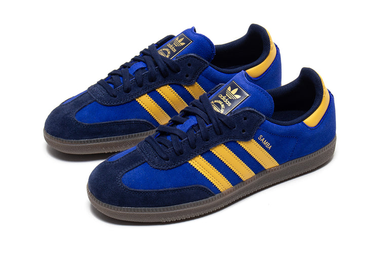 Adidas - Samba ADV
Style # HQ9283
Color : Navy / Yellow / Royal Blue
Materials : Suede Upper - Rubber Outsole
Sizing : US Men's
Cupsole construction