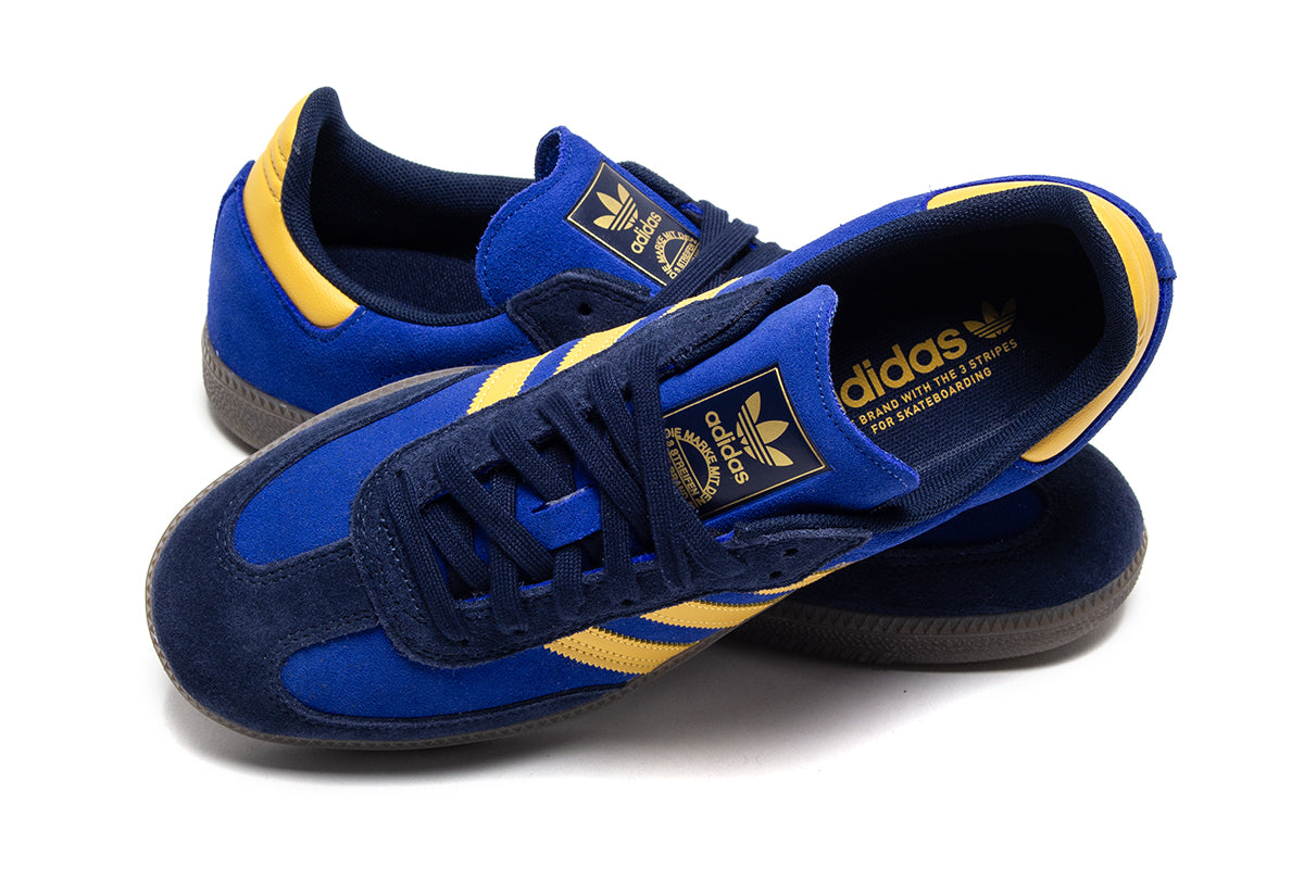 Adidas - Samba ADV
Style # HQ9283
Color : Navy / Yellow / Royal Blue
Materials : Suede Upper - Rubber Outsole
Sizing : US Men's
Cupsole construction