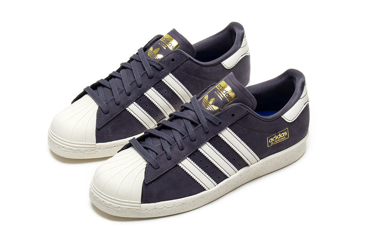 Adidas - Superstar 80 ADV
Style # HQ9289
Color : Grey / White
Materials : Leather / Suede Upper - Rubber Outsole
Sizing : US Men's
Cupsole construction