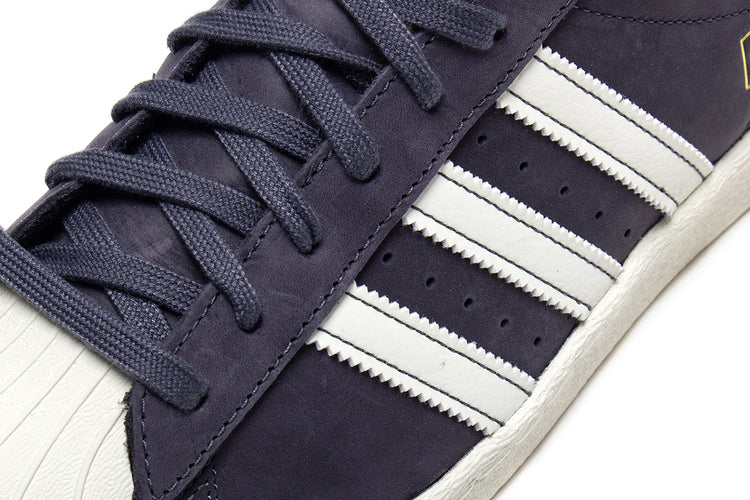 Adidas - Superstar 80 ADV
Style # HQ9289
Color : Grey / White
Materials : Leather / Suede Upper - Rubber Outsole
Sizing : US Men's
Cupsole construction