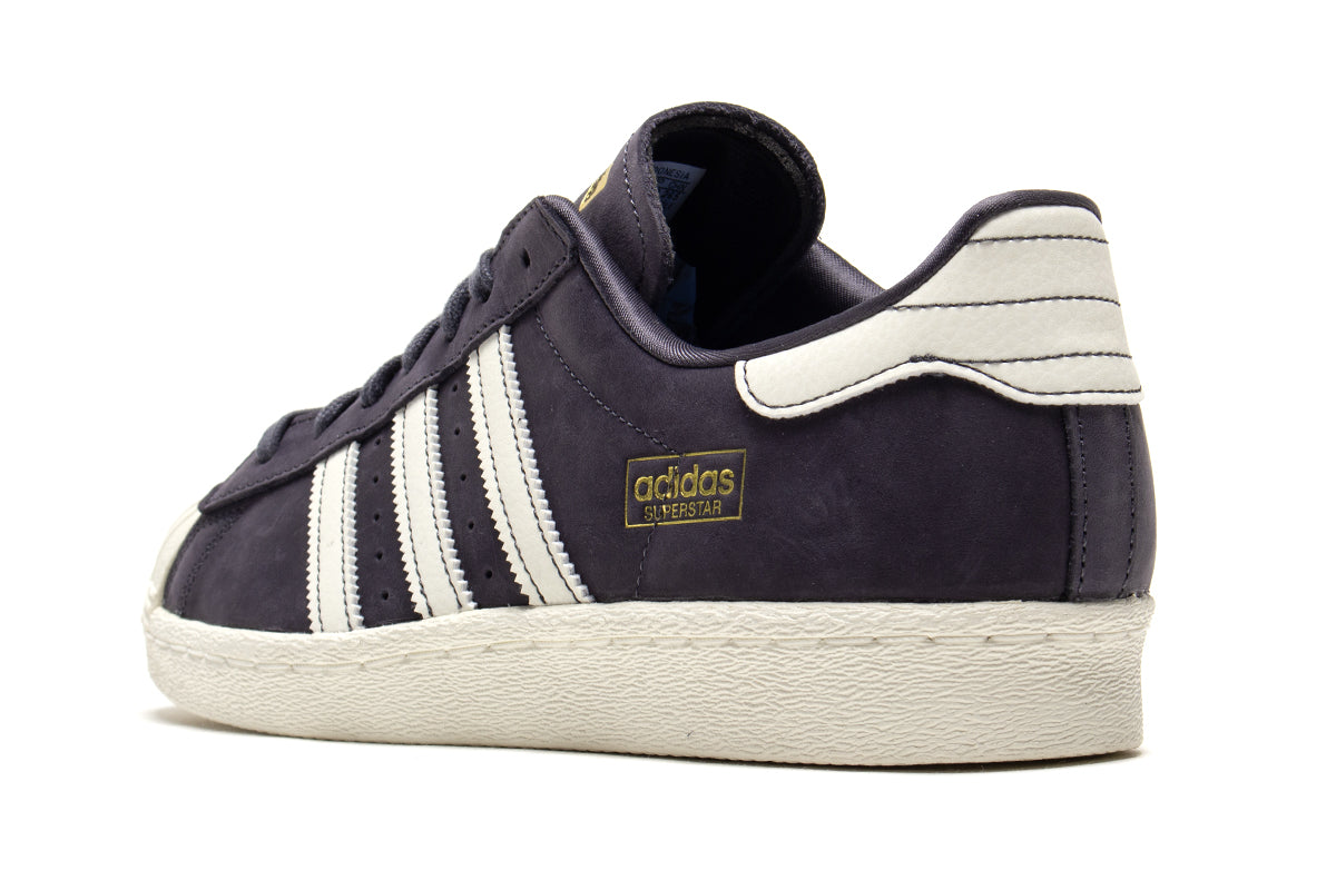 Adidas - Superstar 80 ADV
Style # HQ9289
Color : Grey / White
Materials : Leather / Suede Upper - Rubber Outsole
Sizing : US Men's
Cupsole construction