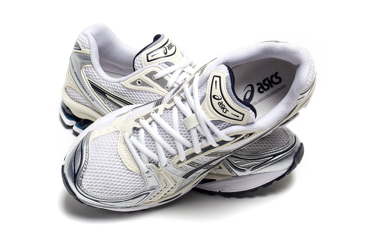 Asics | Women's Gel-Kayano 14
Style # 1202A056.109
Color : White / Midnight