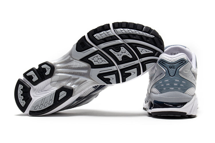 Asics | Gel-Kayano 14
Style # 1203A537.106
Color : White / Fjord Grey