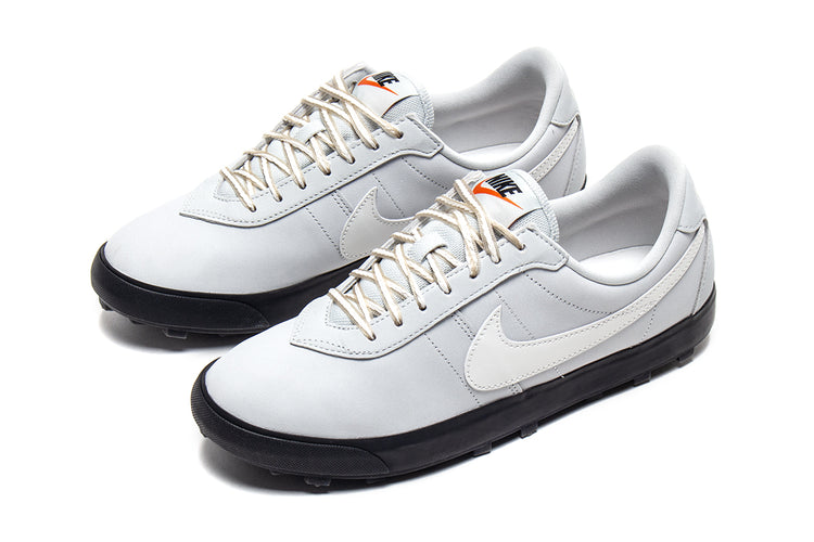 Nike - Astrograbber
Style # IH2341-001
Color : Light Silver / Sail / Phantom / Black
Materials : Leather Upper - Rubber Outsole
Sizing : US Men's