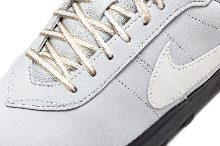 Nike - Astrograbber
Style # IH2341-001
Color : Light Silver / Sail / Phantom / Black
Materials : Leather Upper - Rubber Outsole
Sizing : US Men's