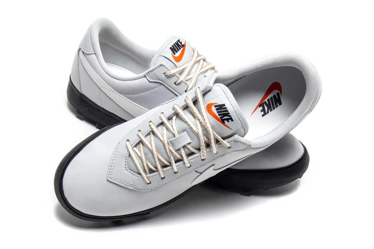 Nike - Astrograbber
Style # IH2341-001
Color : Light Silver / Sail / Phantom / Black
Materials : Leather Upper - Rubber Outsole
Sizing : US Men's