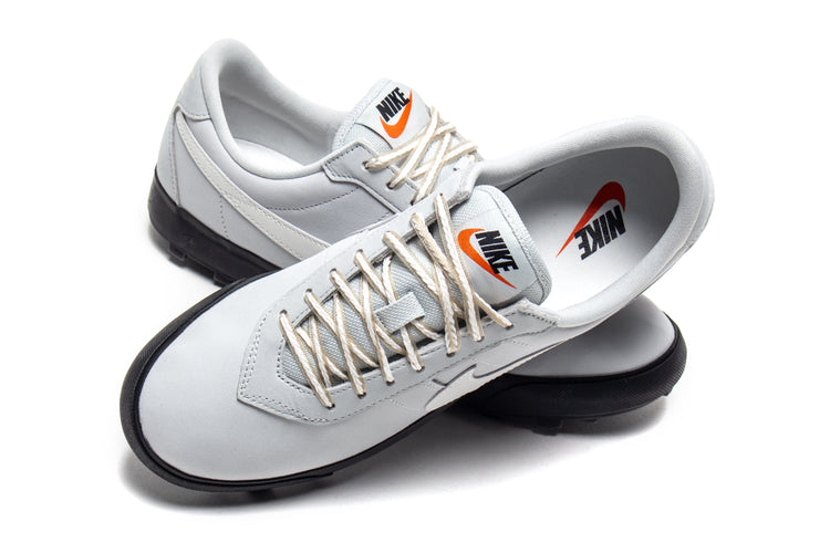 Nike - Astrograbber
Style # IH2341-001
Color : Light Silver / Sail / Phantom / Black
Materials : Leather Upper - Rubber Outsole
Sizing : US Men's