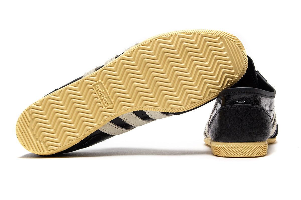 Adidas - Women's Japan Decon
Style # KJ6212
Color : Core Black / Cream White / Orange Tint
Materials : Leather / Suede Upper - Rubber Outsole
Sizing : US Women's