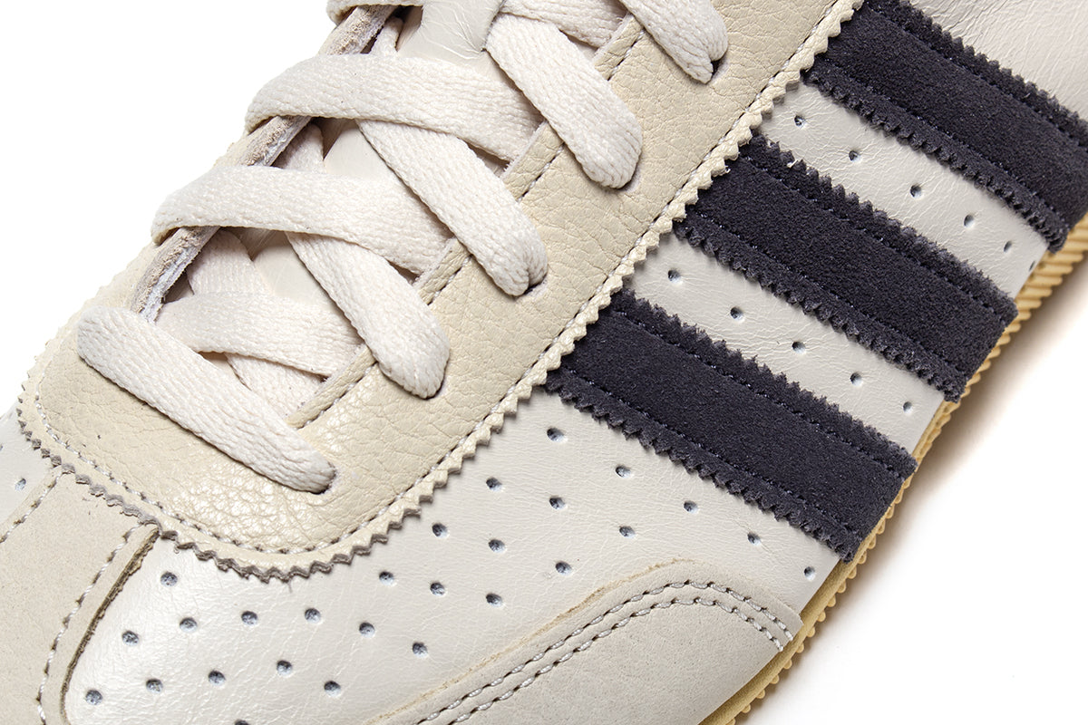 Adidas - Women's Japan Decon
Style # KJ6213
Color : Cream White / Utility Black / Orange Tint
Materials : Leather / Suede Upper - Rubber Outsole
Sizing : US Women's