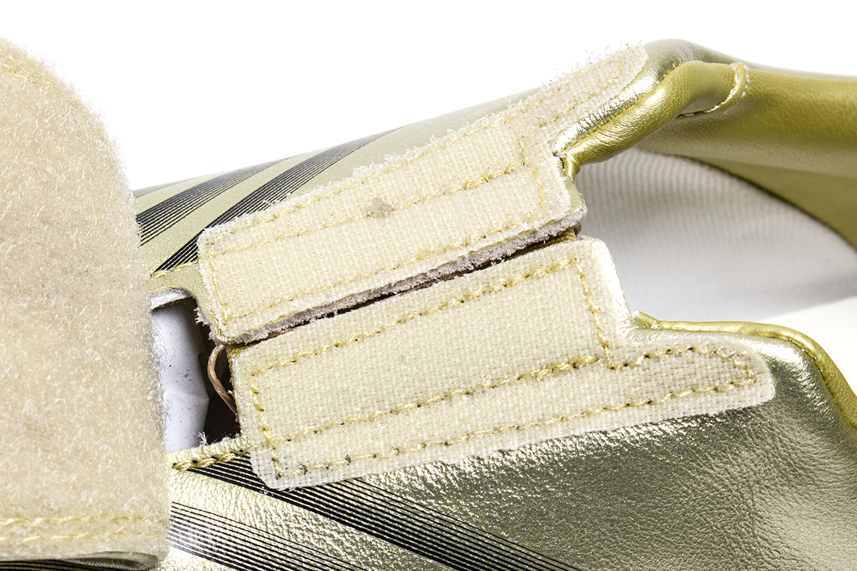 Adidas - Women's Taekwondo F50
Style # IH1872
Color : Gold Metallic / Core Black / Off White
Materials : Leather Upper - Rubber Outsole
Sizing : US Women's