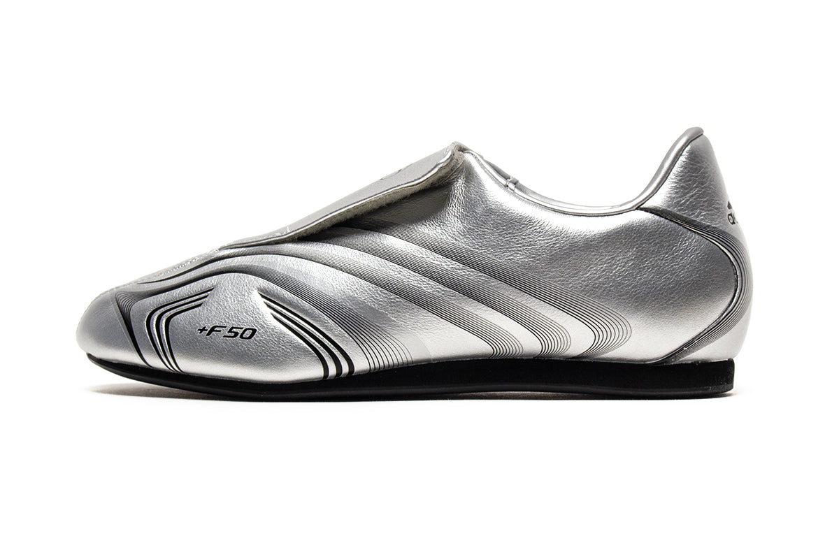 Adidas - Women's Taekwondo F50
Style # IH1873
Color : Silver Metallic / Core Black
Materials : Leather Upper - Rubber Outsole
Sizing : US Women's