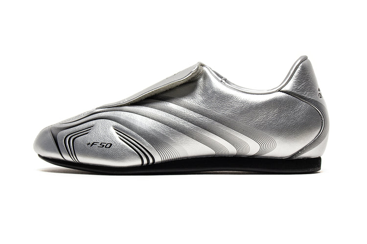 Adidas - Women's Taekwondo F50
Style # IH1873
Color : Silver Metallic / Core Black
Materials : Leather Upper - Rubber Outsole
Sizing : US Women's