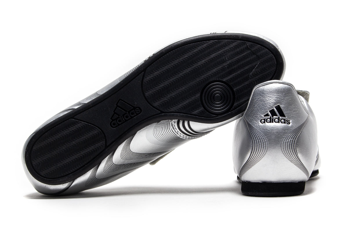 Adidas - Women's Taekwondo F50
Style # IH1873
Color : Silver Metallic / Core Black
Materials : Leather Upper - Rubber Outsole
Sizing : US Women's