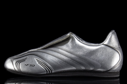 Adidas - Women's Taekwondo F50
Style # IH1873
Color : Silver Metallic / Core Black
Materials : Leather Upper - Rubber Outsole
Sizing : US Women's