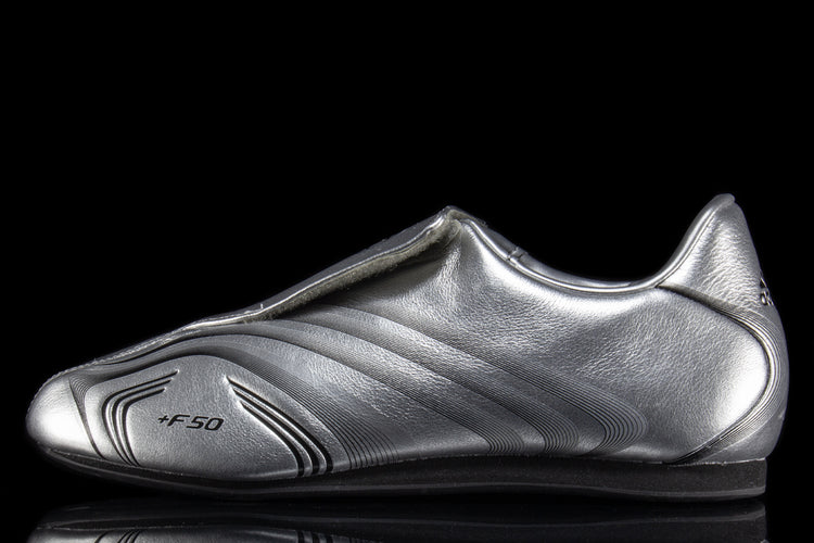 Adidas - Women's Taekwondo F50
Style # IH1873
Color : Silver Metallic / Core Black
Materials : Leather Upper - Rubber Outsole
Sizing : US Women's