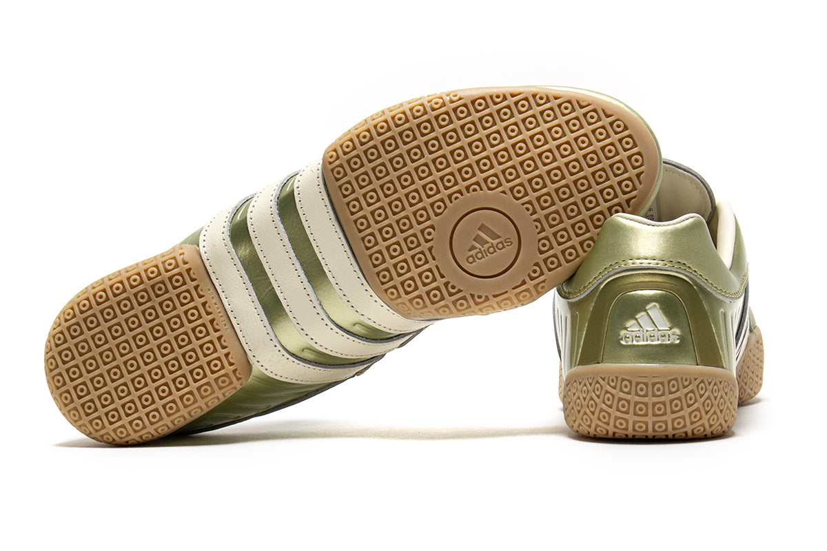 Adidas - Women's Taekwondo Mei Elite
Style # JR1827
Color : Gold Metallic / White / Gum
Materials : Leather Upper - Rubber Outsole
Sizing : US Women's