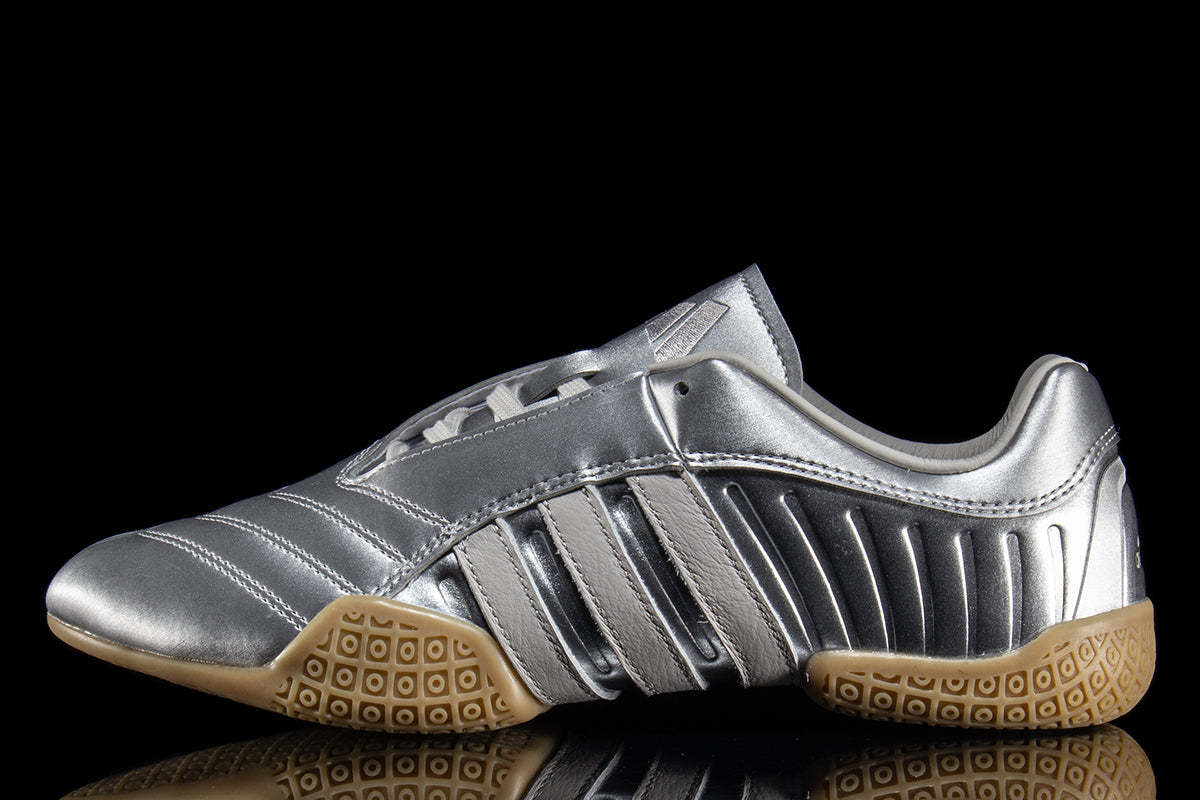 Adidas - Women's Taekwondo Mei Elite
Style # IH9387
Color : Silver Metallic / Grey One / Gum
Materials : Leather Upper - Rubber Outsole
Sizing : US Women's