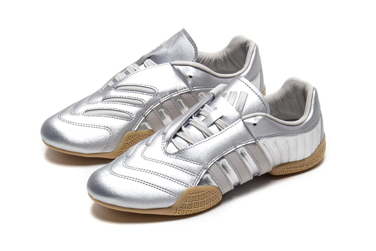 Adidas - Women's Taekwondo Mei Elite
Style # IH9387
Color : Silver Metallic / Grey One / Gum
Materials : Leather Upper - Rubber Outsole
Sizing : US Women's