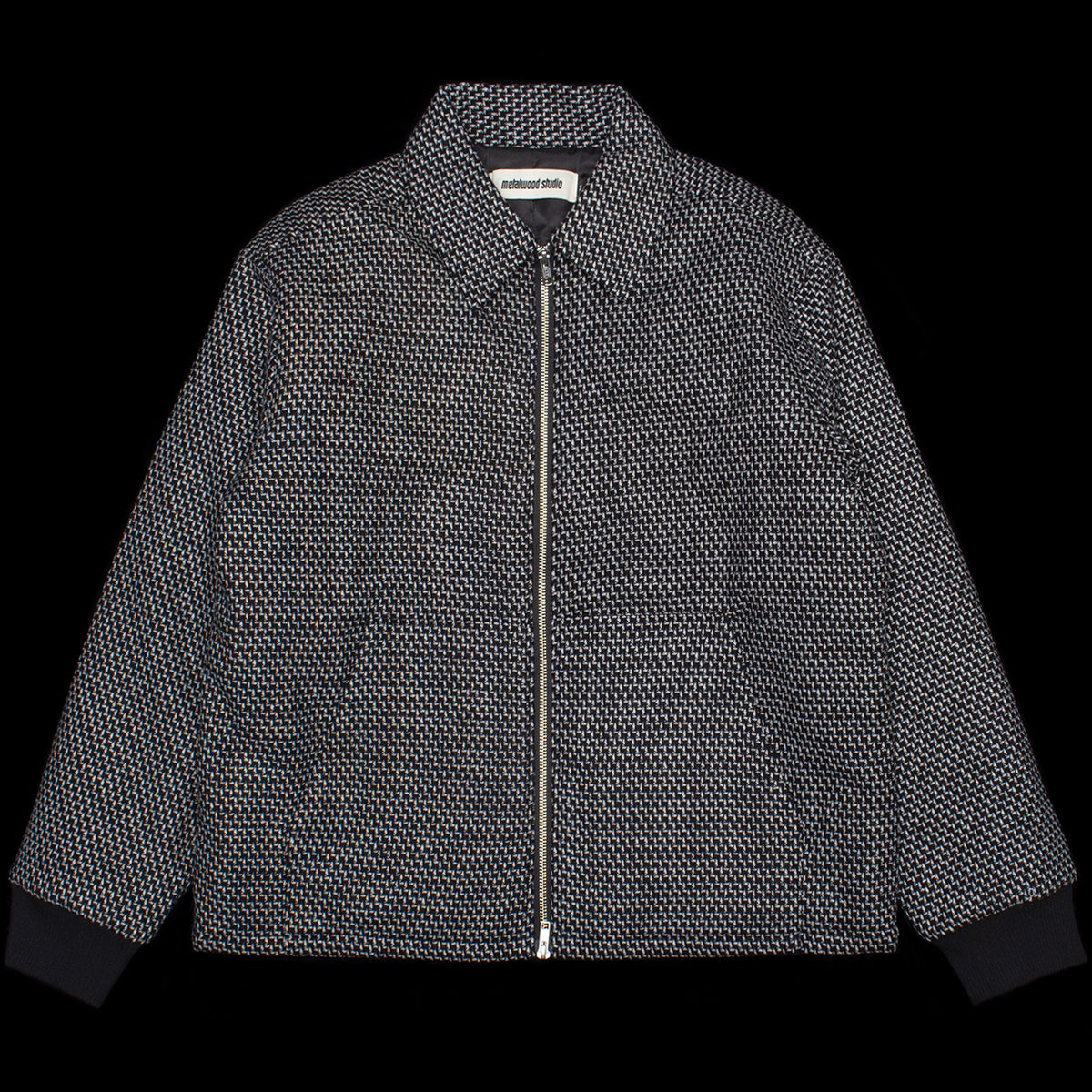 Metalwood - Mechanic Jacket
Color : Black
Materials : 100% Melton Wool - Poly Fiil

2-way front zip closure
Side hand pockets
Metal charm on back neck
Ribbed cuffs