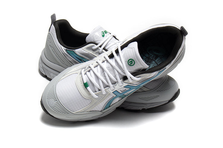 Asics | Gel-Venture 6 Shield
Style # 1203A778.100
Color : White / Wasabi