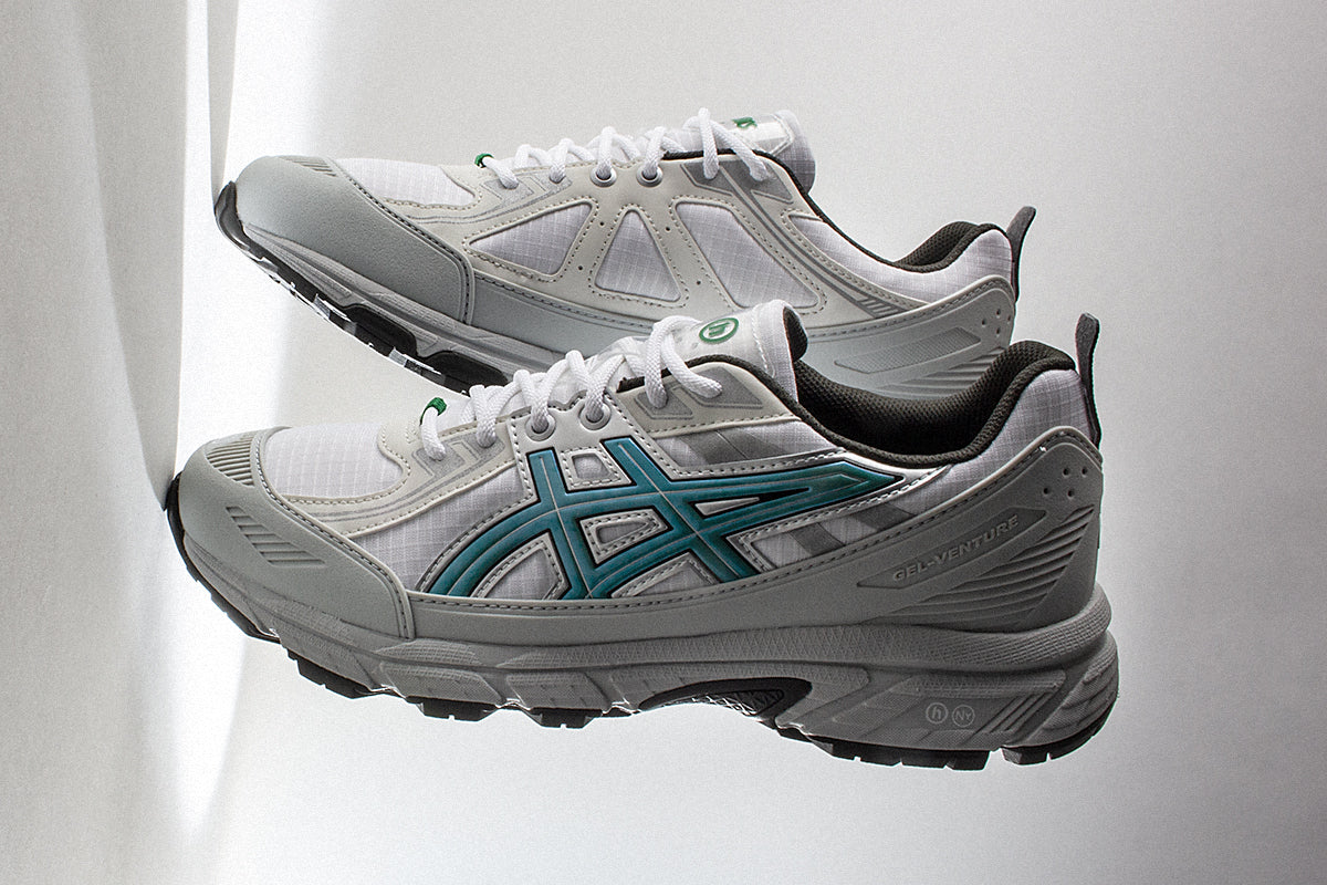 Asics | Gel-Venture 6 Shield
Style # 1203A778.100
Color : White / Wasabi