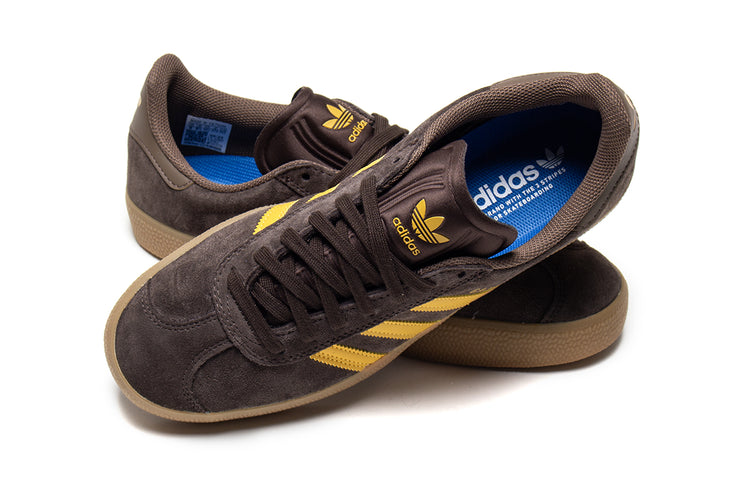 Adidas | Gazelle ADV
Style # JP5857
Color : Dark Brown / Preloved Yellow / Earth Strata