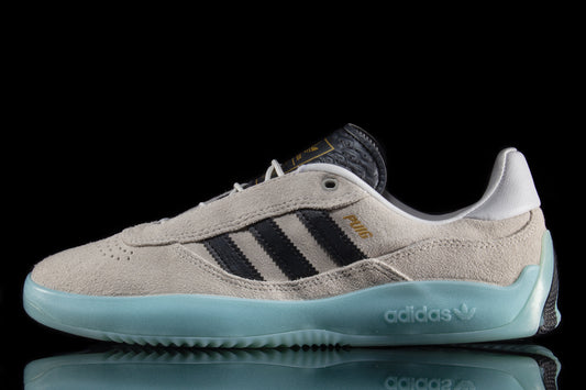 Adidas | Puig
Style # JH8166
Color : Crystal White / Core Black / Light Aqua