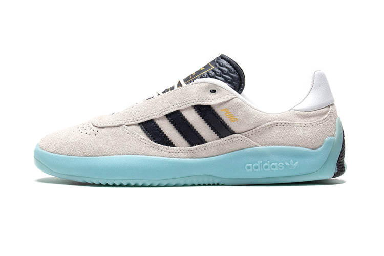 Adidas | Puig
Style # JH8166
Color : Crystal White / Core Black / Light Aqua