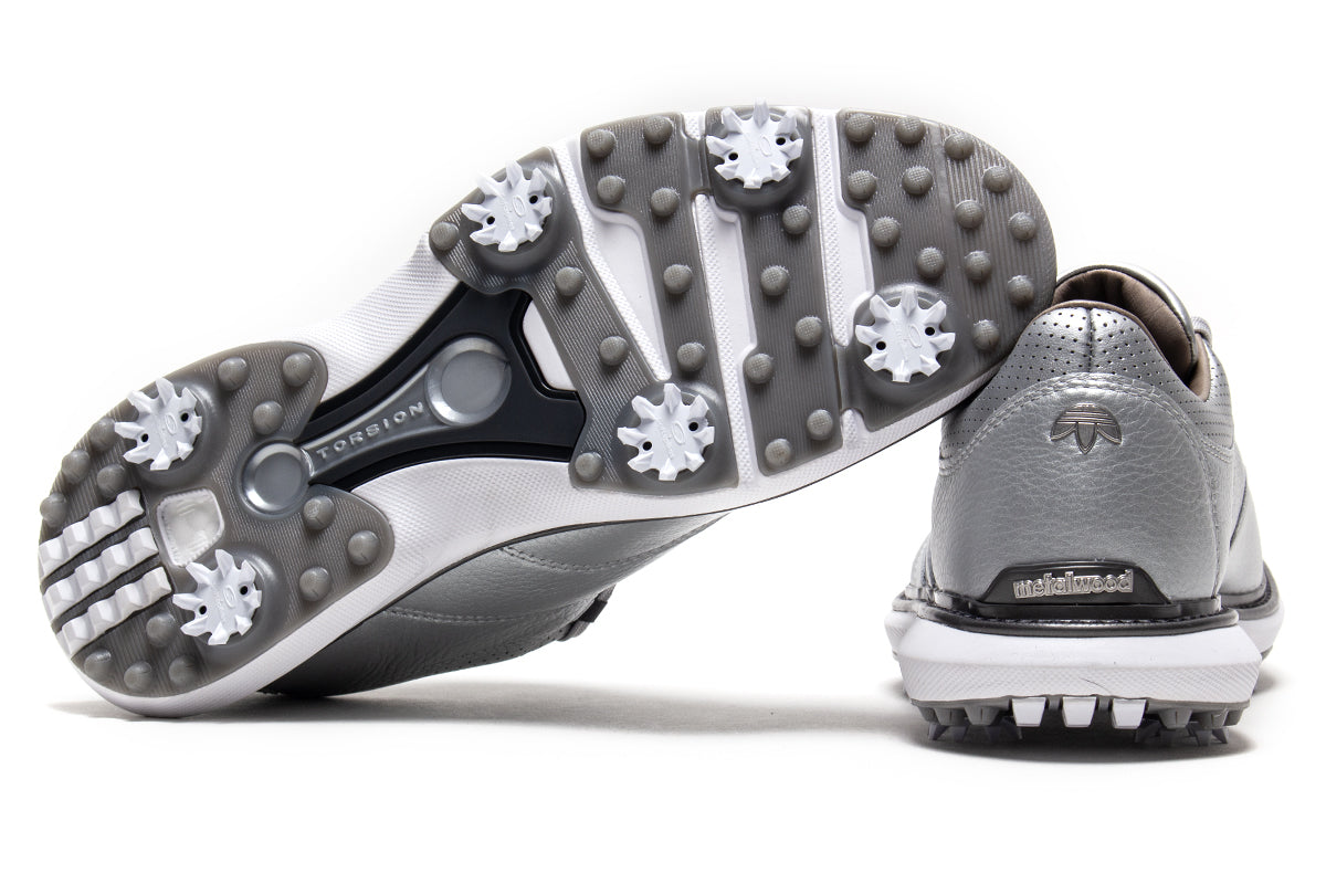 Adidas Originals x Metalwood MC70
Style # JQ7260
Color : Silver Metallic / Iron Metallic / Grey Six