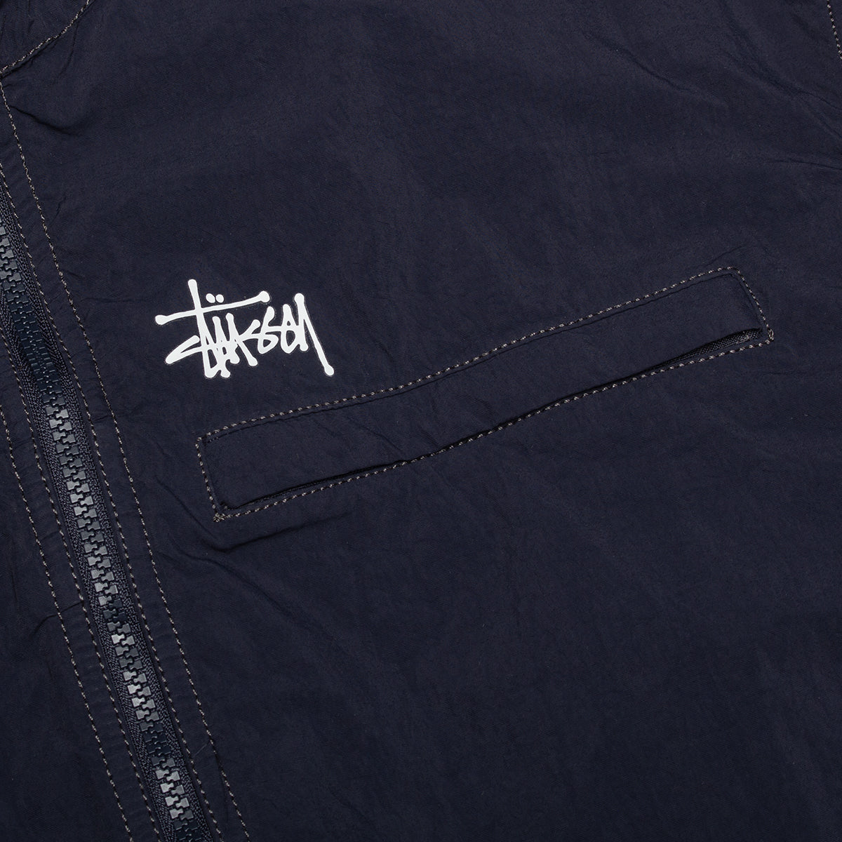 Stussy - Lightweight Hooded Jacket
Style # 115900
Color : Navy