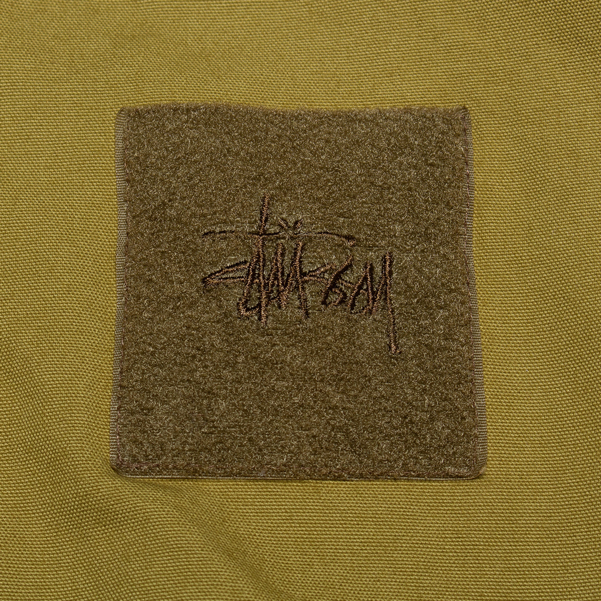 Stussy - Flight Bomber
Style # 115837
Color : Golden Olive
