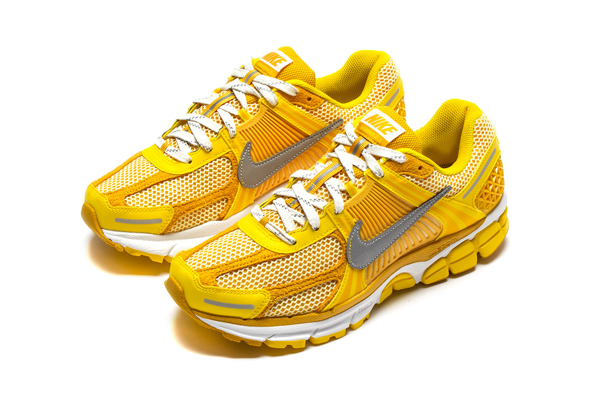 Nike - Zoom Vomero 5
Style # FJ4453-765
Color : Yellow Strike / Metallic Silver